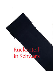 Schwarzes Rückenteil des Merinokleids Céphée – Detailansicht des feinen Rippstricks aus Merinowolle, made in France